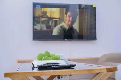 a tv sitting on top of a table at Sonia homes shared in Arusha