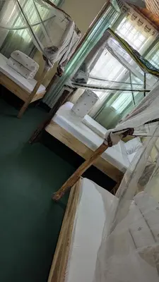 an overhead view of a bunk bed in a room at Kilimanjaroo Inn in Moshi