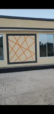 a garage door with a geometric design on it at Ma lo Lounge n Lodge