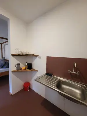 a kitchen with a sink in a room at House, towncenter, near to all good restaurants, in Arusha