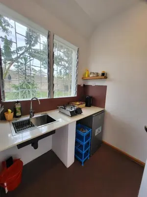 a kitchen with a sink and a window at House, towncenter, near to all good restaurants, in Arusha