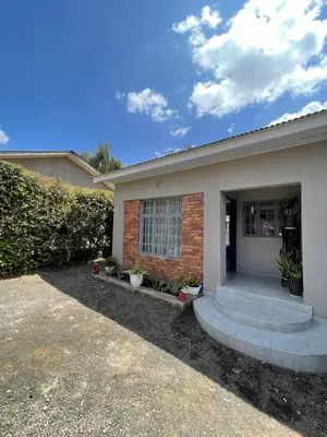 a house with a driveway in front of it at Casabella stay in Arusha