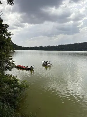 a group of people in boats on a lake at NgareSero Haven - Eco 3BR Home with Garden and Farm in Usa River