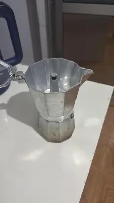 a metal container sitting on top of a table at Arusha Oasis Executive Residence in Arusha