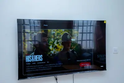a television screen with a movie on it at Arusha 2bedroom in Arusha