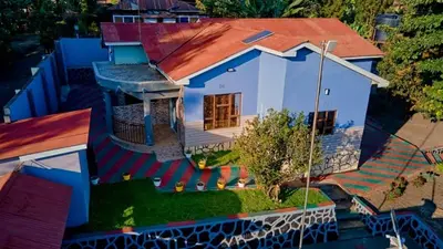 a model of a house with a roof at Zaal stays in Arusha
