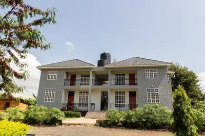 an image of a large house at Kitopua suites in Arusha