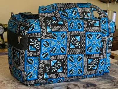 a large blue and white bag sitting on a table at Mabegi african Designs in Arusha