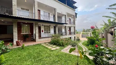 a view of a house with a yard at Iwandaa Apartments in Nkoanrua