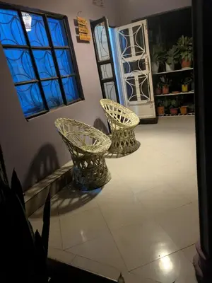 two baskets sitting on a floor in a room at masai mama ecohostels in Arusha