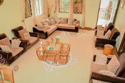 an overhead view of a living room with couches and a table at Kilimanjaro Serenity Lodge & Camp