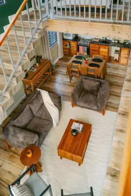 a living room with a couch and a table at Starico Residence in Nkoanrua