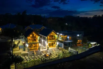 a large house at night with lights at Starico Residence in Nkoanrua