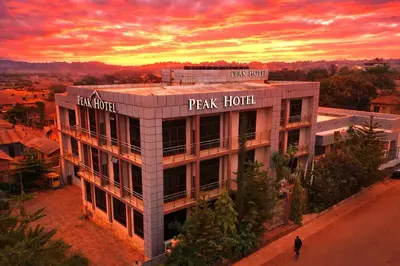 a building with the words park hotel on the top of it at Peak Hotel & Safaris in Karatu