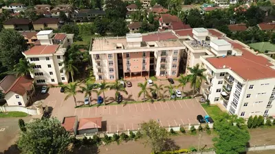an overhead view of a building with palm trees at JJ Comfort Homes in Arusha