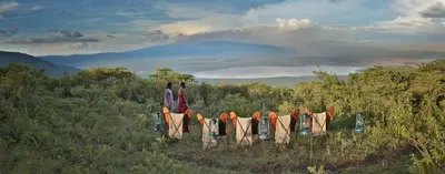 two people standing on top of a hill with clotheslines at Pakulala Safari Camp - Ngorongoro in Ngorongoro
