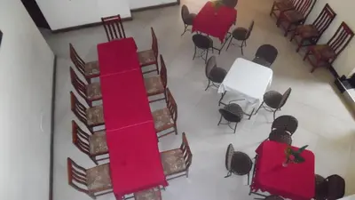 an overhead view of a room with a table and chairs at Bright Star Hotel & Safaris in Arusha
