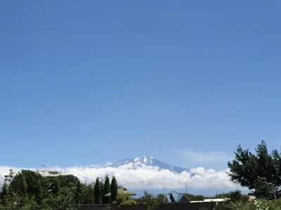 a view of a mountain in the clouds at Le Parlour in Boma la Ngombe