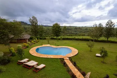 an overhead view of a swimming pool in a yard at Karatu Tented Lodge in Karatu