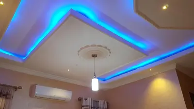 a room with blue lights on the ceiling at Cape of Goodhope Vacation Home in Arusha