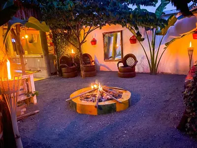 a fire pit in the middle of a yard at Home Villa Eco Boutique in Arusha