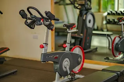 an electric scooter in a gym with a exercise bike at Arusha Planet Lodge in Arusha