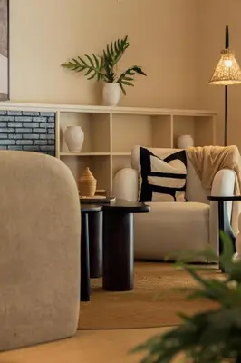 a living room with a couch and a table at Tulia Retreat Hotel and Spa in Arusha