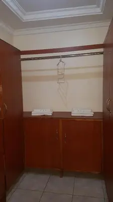 a room with a basketball hoop on a wall at The House of Black and White in Arusha