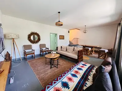 a living room with a couch and a table at City Retreat Arusha in Arusha