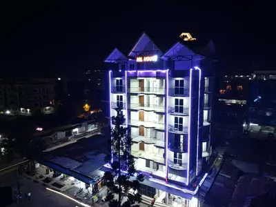 a building with purple lights on top of it at Hil Venture in Arusha