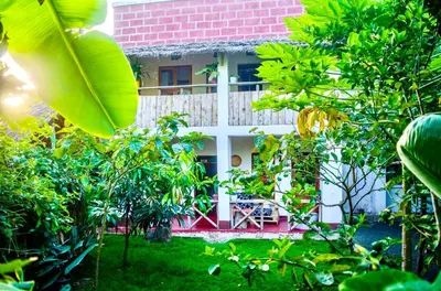 a view of a house from the garden at Arusha Jua Eco Home- on coffee farm in Arusha