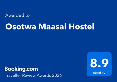 a blue sign with the words oscania masala hospital at Osotwa Maasai Hostel in Arusha