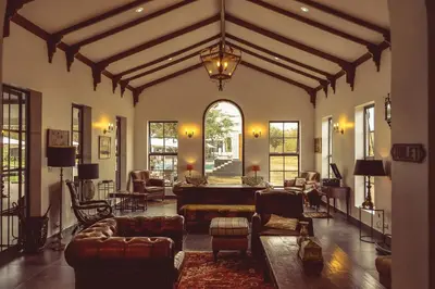 a large living room with couches and chairs at Kili Seasons Hotel in Arusha