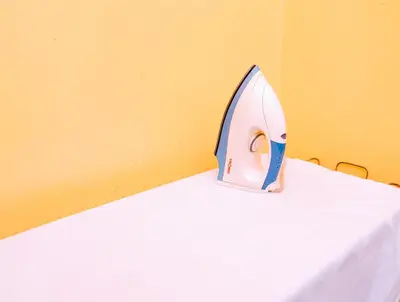 a paper boat sitting on top of a table at FARAJA HOMESTAY- Seamless Comfort in the Heart of the City - Free WiFi, Warm Hospitality, and Local Delights Await in Moshi