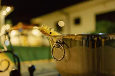 a bucket with a bottle in it at Sarita Village Homes in Arusha