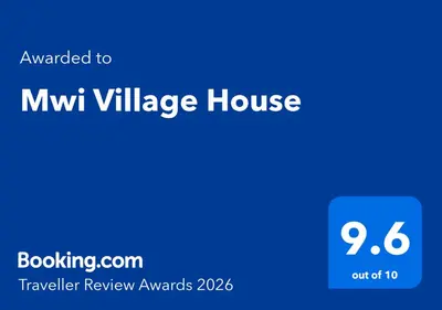 a screenshot of a miwv village house with the text upgraded to myk at Mwi Village House in Mto wa Mbu