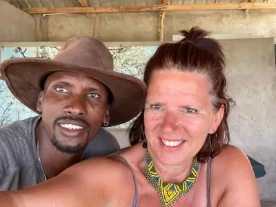 a man and a woman wearing a cowboy hat at Lake Natron Maasai Guesthouse in Mtowabaga