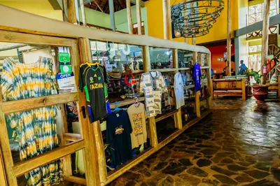 a store with a bunch of suitcases on display at Weru Weru River Lodge in Moshi