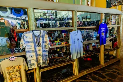 a store with shirts and other merchandise on display at Weru Weru River Lodge in Moshi